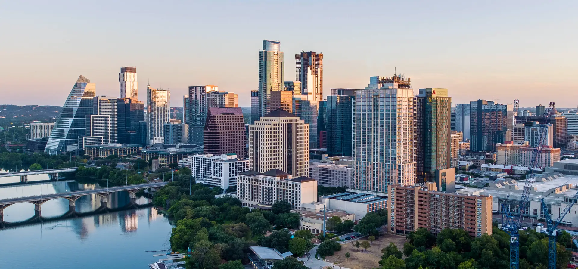 Downtown Austin, Texas skyline at dusk along the Colorado River