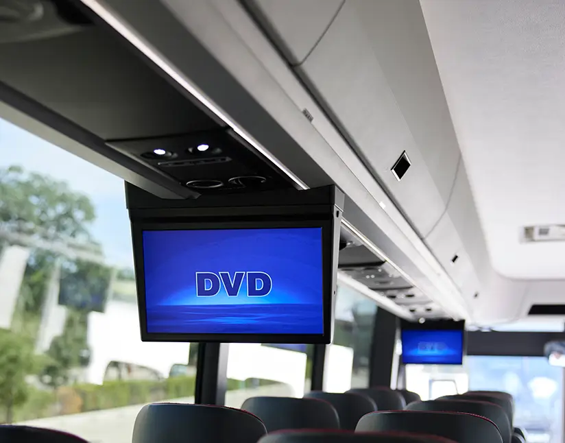 Overhead DVD monitor inside a First Class Transportation motorcoach